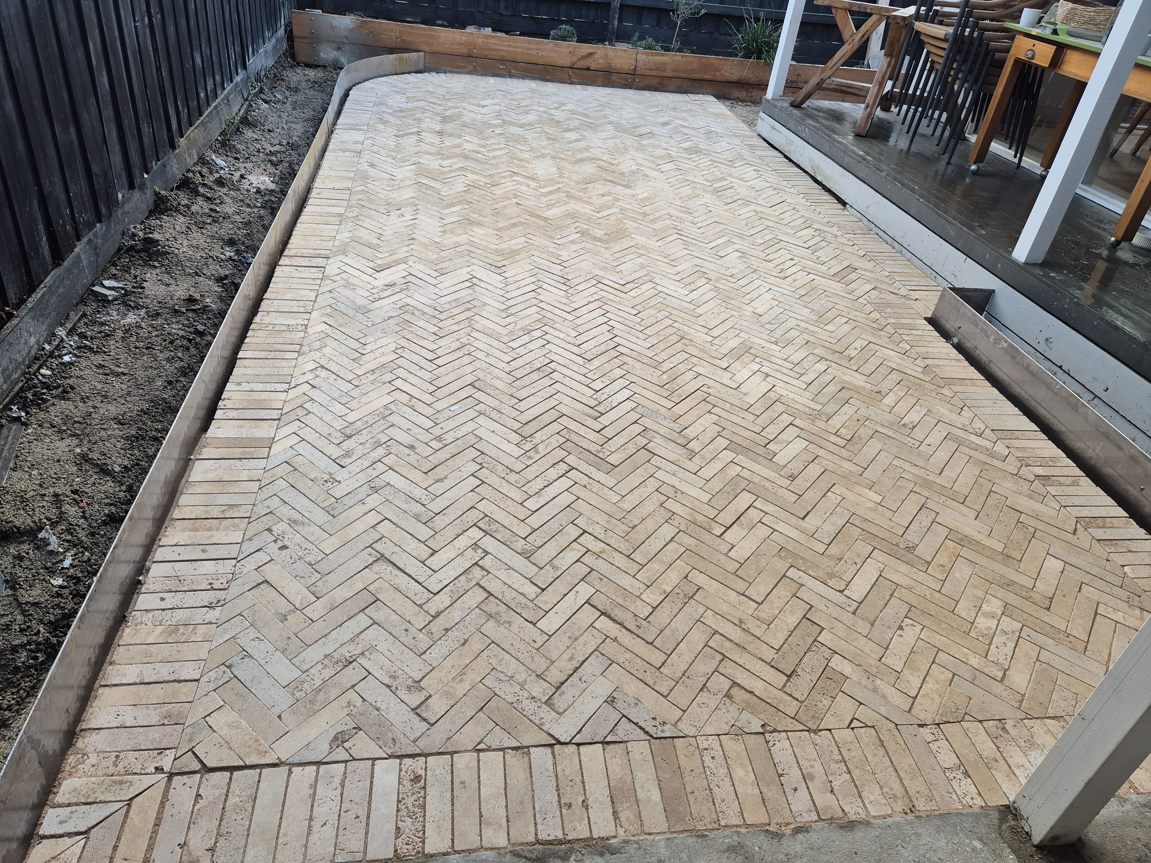Travertine herringbone paved alfresco patio, Melbourne