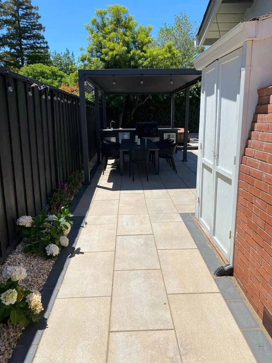 Large-format porcelain paving by Antonio PrimeScape Construction