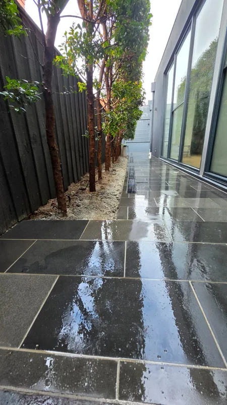 Bluestone paver walkway laid on a compacted base