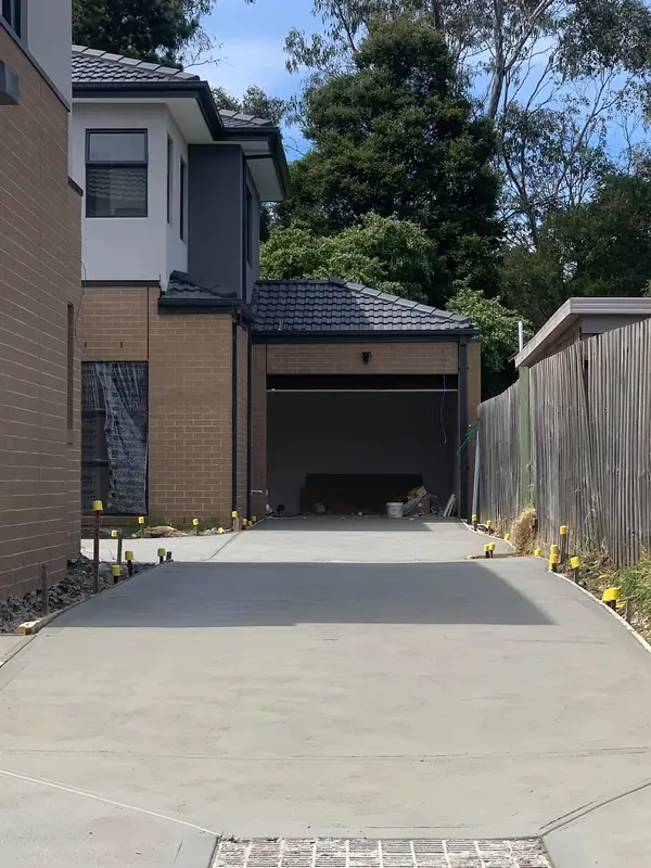 New plain concrete driveway at a new home