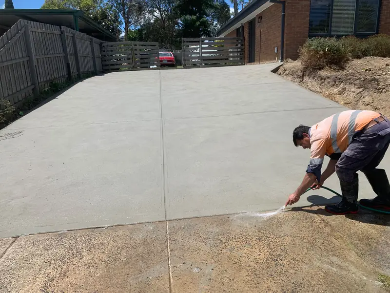 Plain finish concrete driveway with saw-cut joints