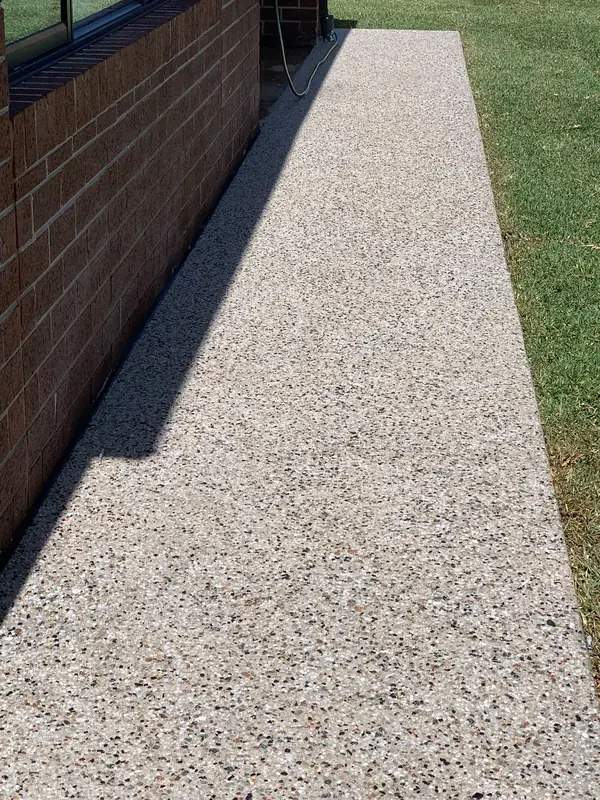 Exposed aggregate concrete side path