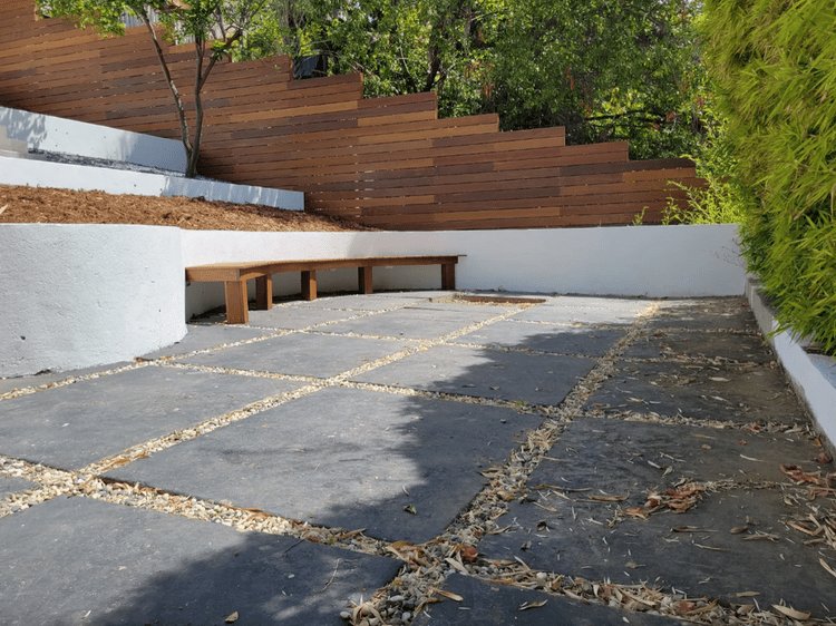 Bluestone paving with pebble-filled joints, Melbourne backyard